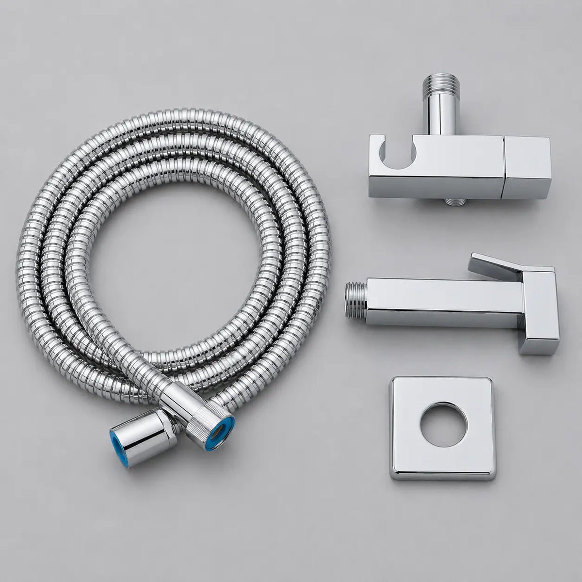 Kit douchette WC chromé avec flexible inox, support mural carré et douchette hygiénique moderne.