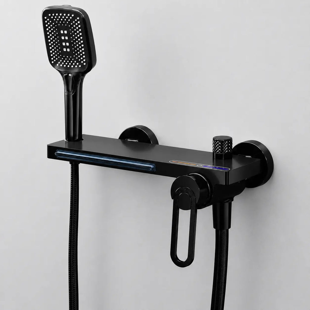 Robinet mural baignoire douche noir mat avec douchette à main, commande intégrée et design moderne épuré.