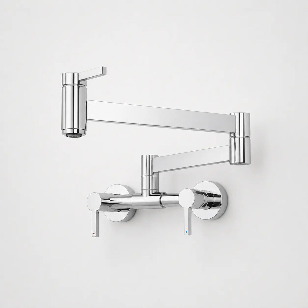 Robinet mural de cuisine chromé à bras articulé pivotant avec double commande, design moderne et finition brillante.