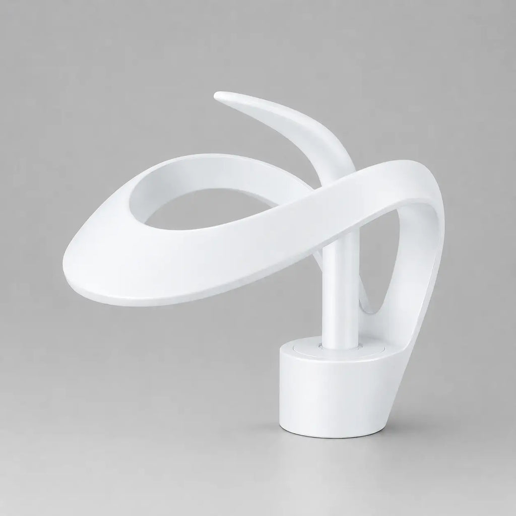Robinet de lavabo cascade blanc en laiton au design sculptural avec bec fluide et finition moderne élégante.