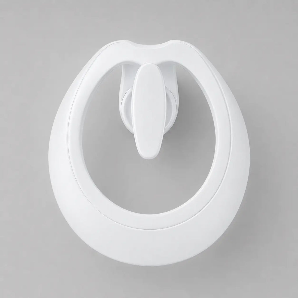 Robinet de lavabo cascade blanc en laiton, vue supérieure, avec design organique aux courbes fluides et finition moderne.
