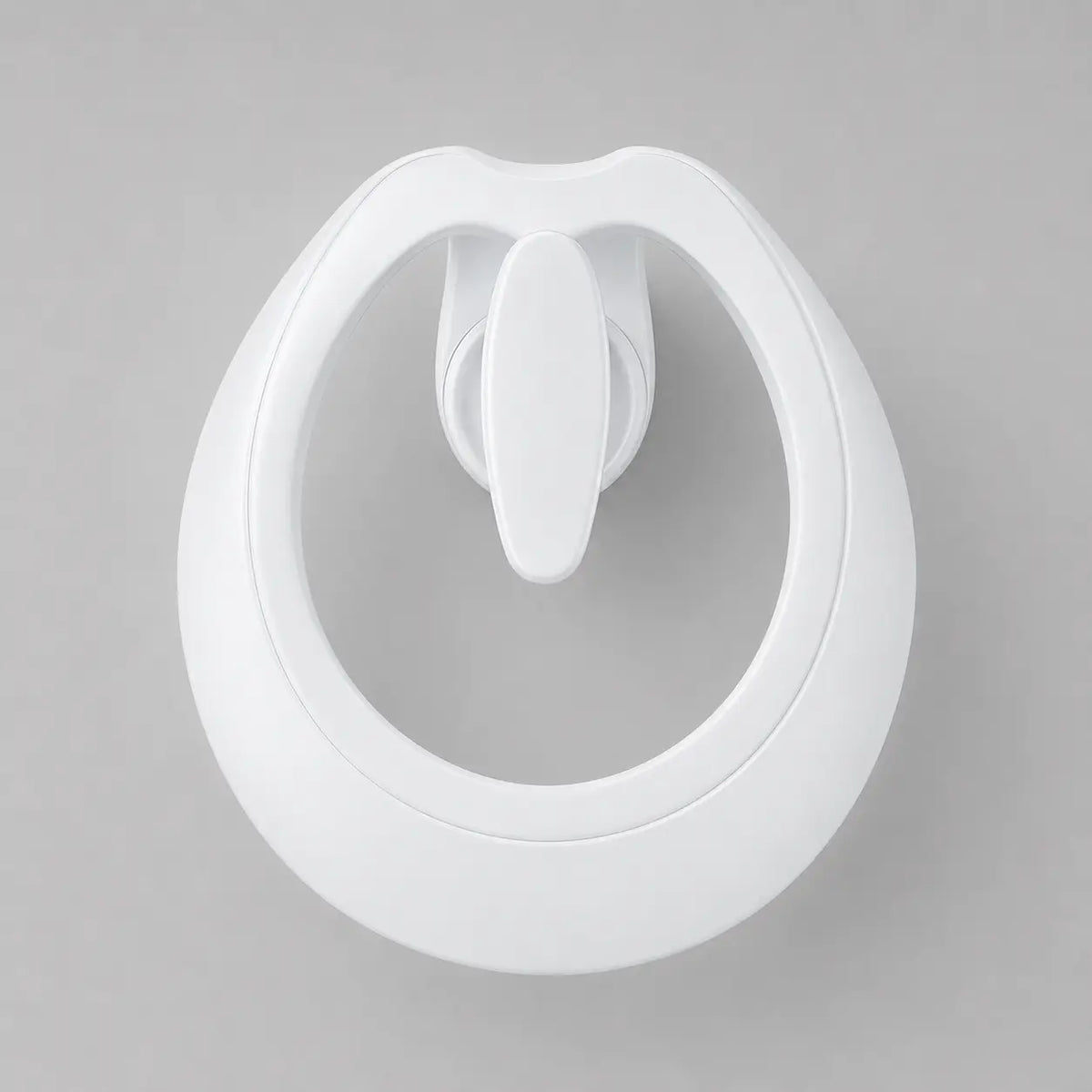 Robinet de lavabo cascade blanc en laiton, vue supérieure, avec design organique aux courbes fluides et finition moderne.