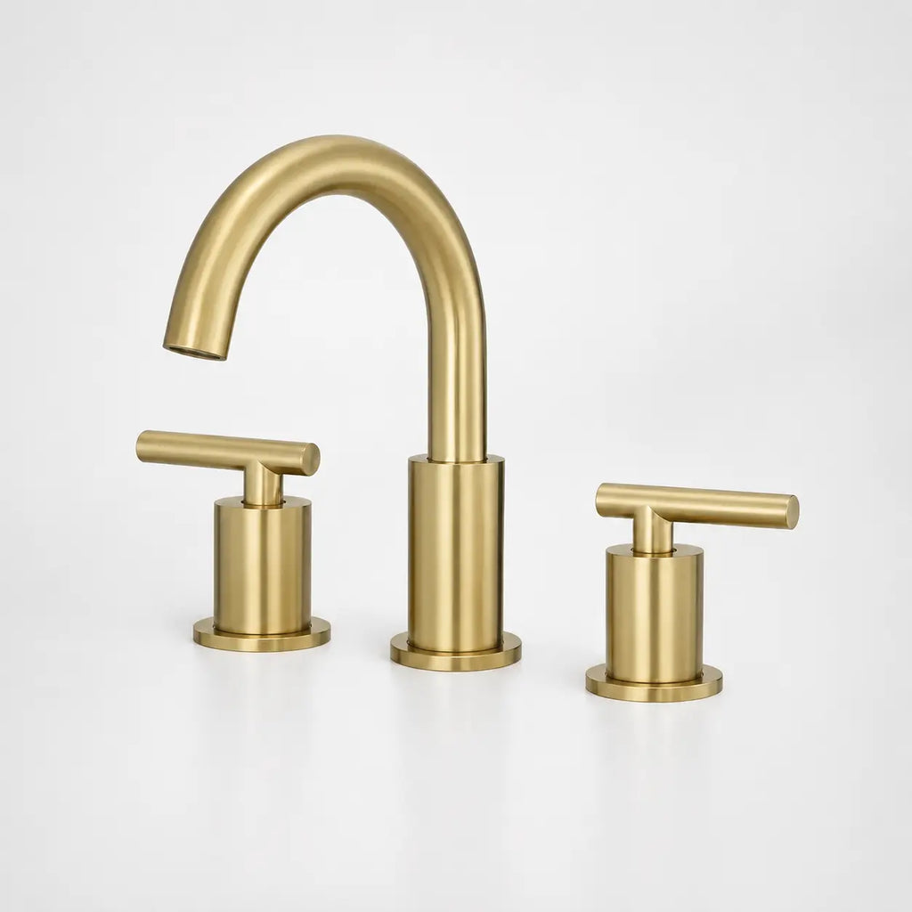  Robinet de lavabo 3 trous en laiton brossé doré avec bec incurvé et poignées cylindriques modernes
